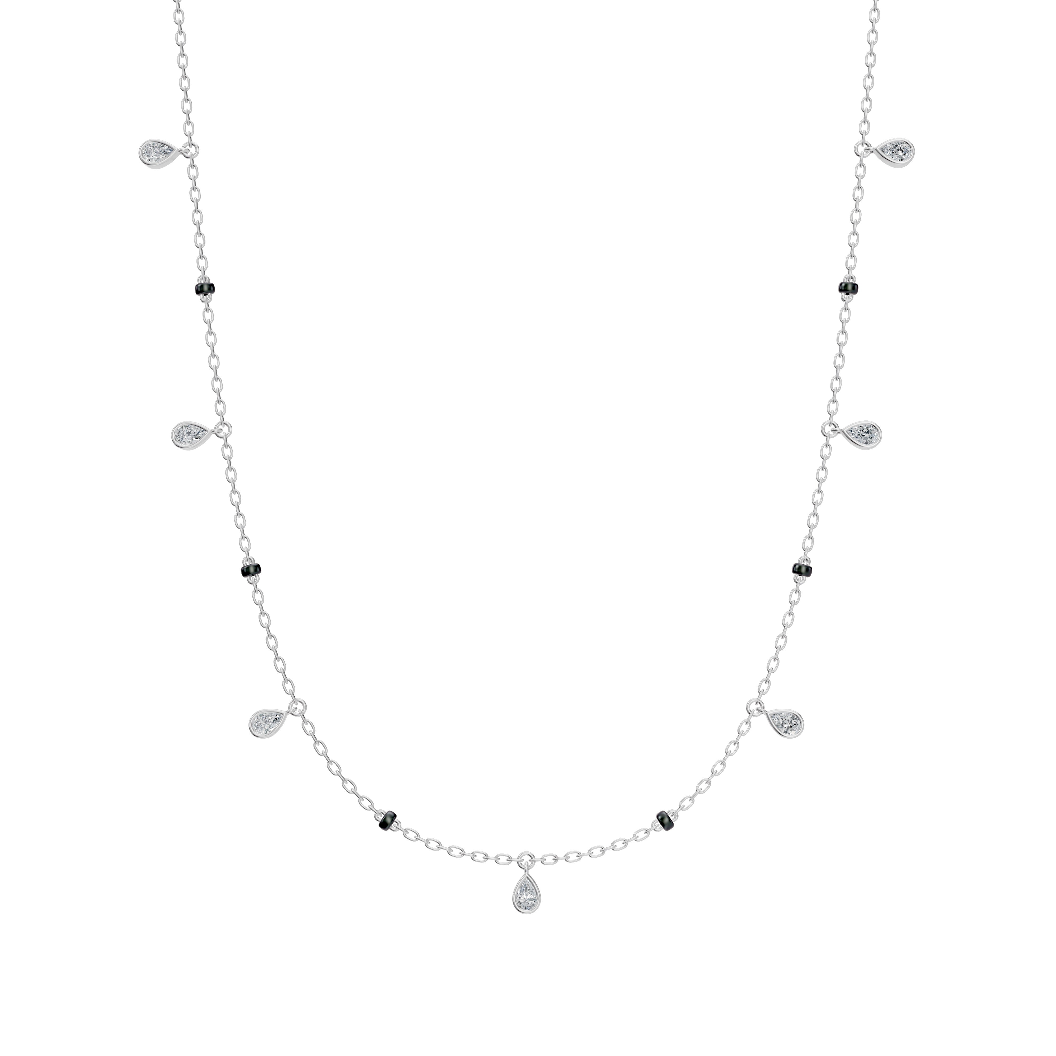 Front product image of the  Modern Mangal Shivani Mangalsutra in white gold, with a clean bezel-set pear-shaped diamond pendant dangling from black bead dual chains.

