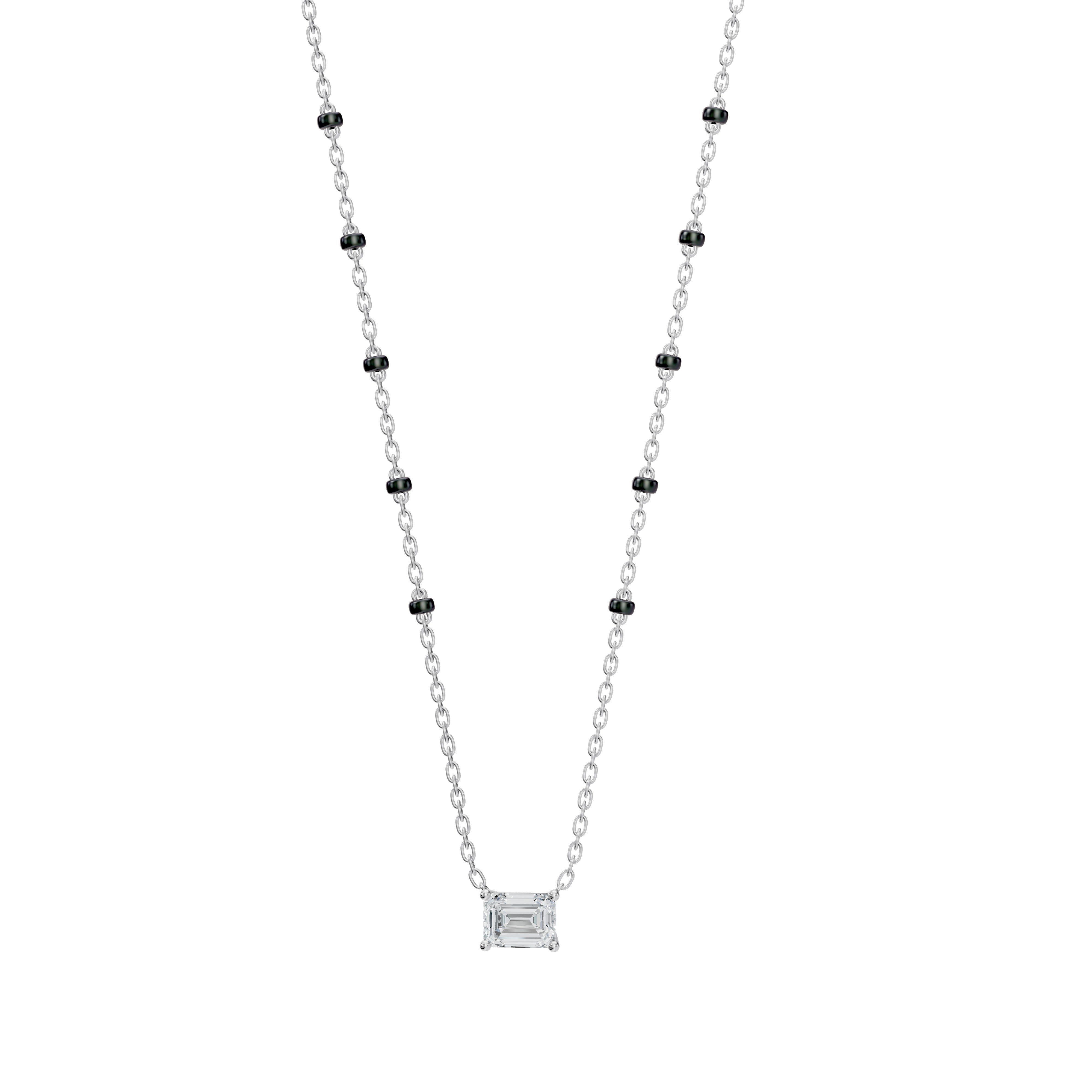 White gold Modern Mangal Aanchal mangalsutra with spaced 5-bead dual black bead chains and a minimalist pendant set with striking emerald-cut diamonds for a polished, luxe look.
