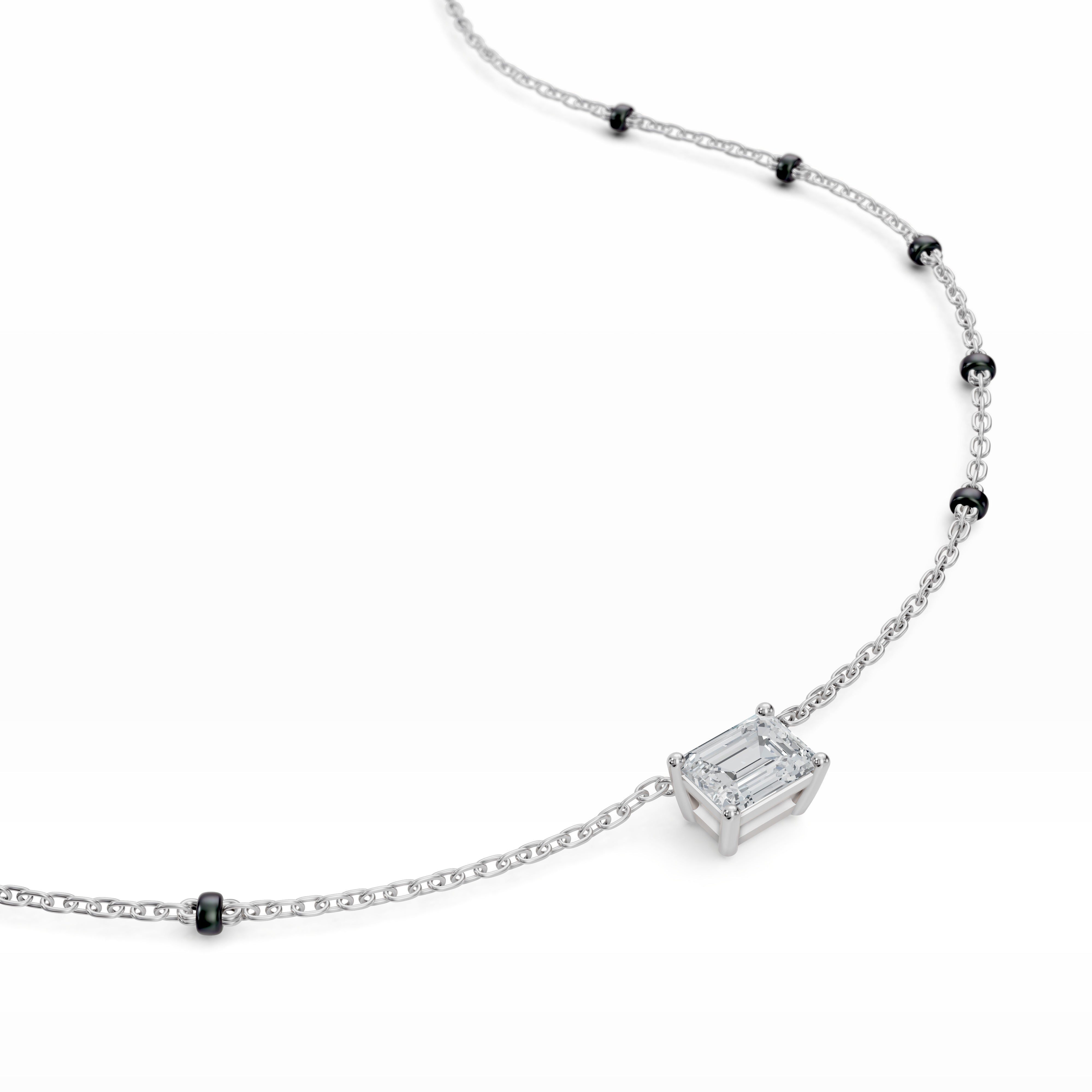 Modern Mangal Close-up of the pendant in white gold, emphasizing the crisp structure and mirror-like facets of the emerald-cut diamonds suspended from a spaced bead chain.