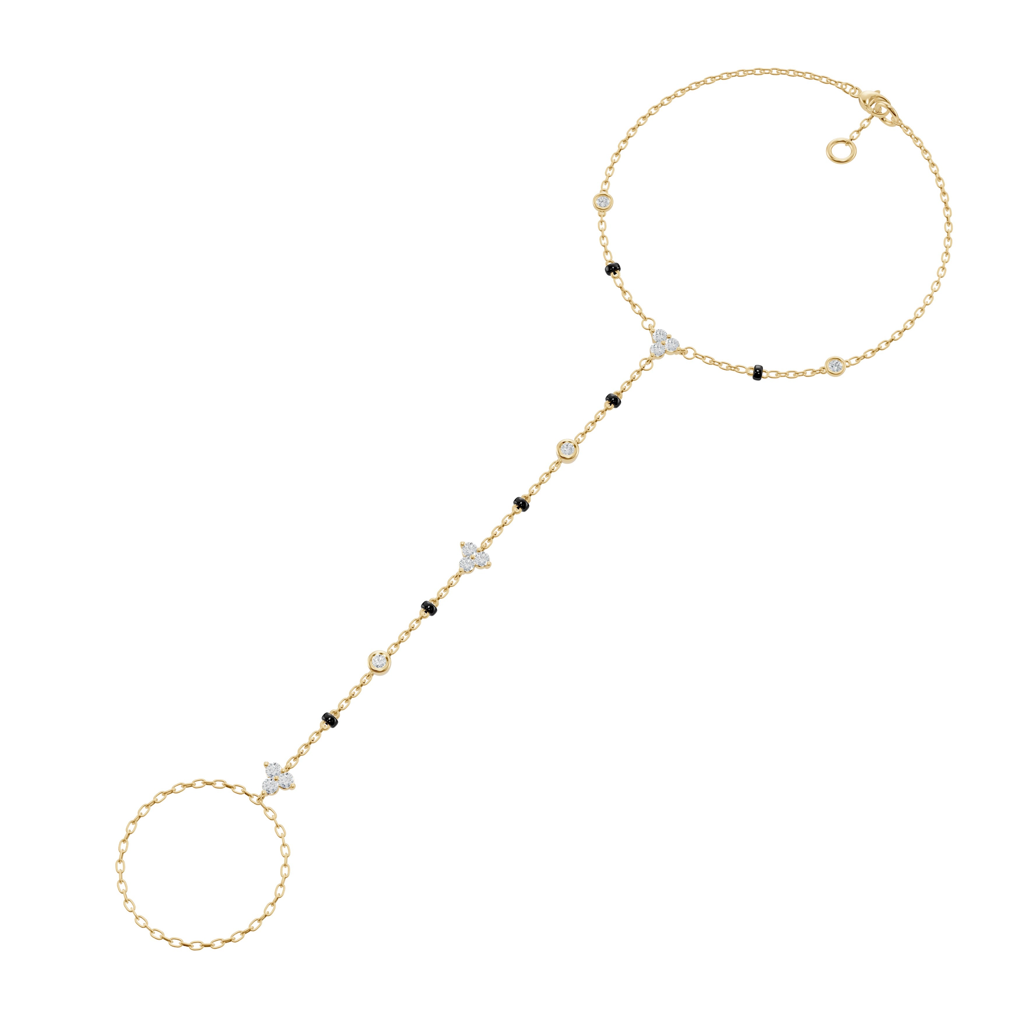 Front-facing product image of the Modern Mangal Heartstring Handchain Mangalsutra in yellow gold, showcasing three sets of trio diamonds and a chain of bezel-set diamonds leading to the finger loop.