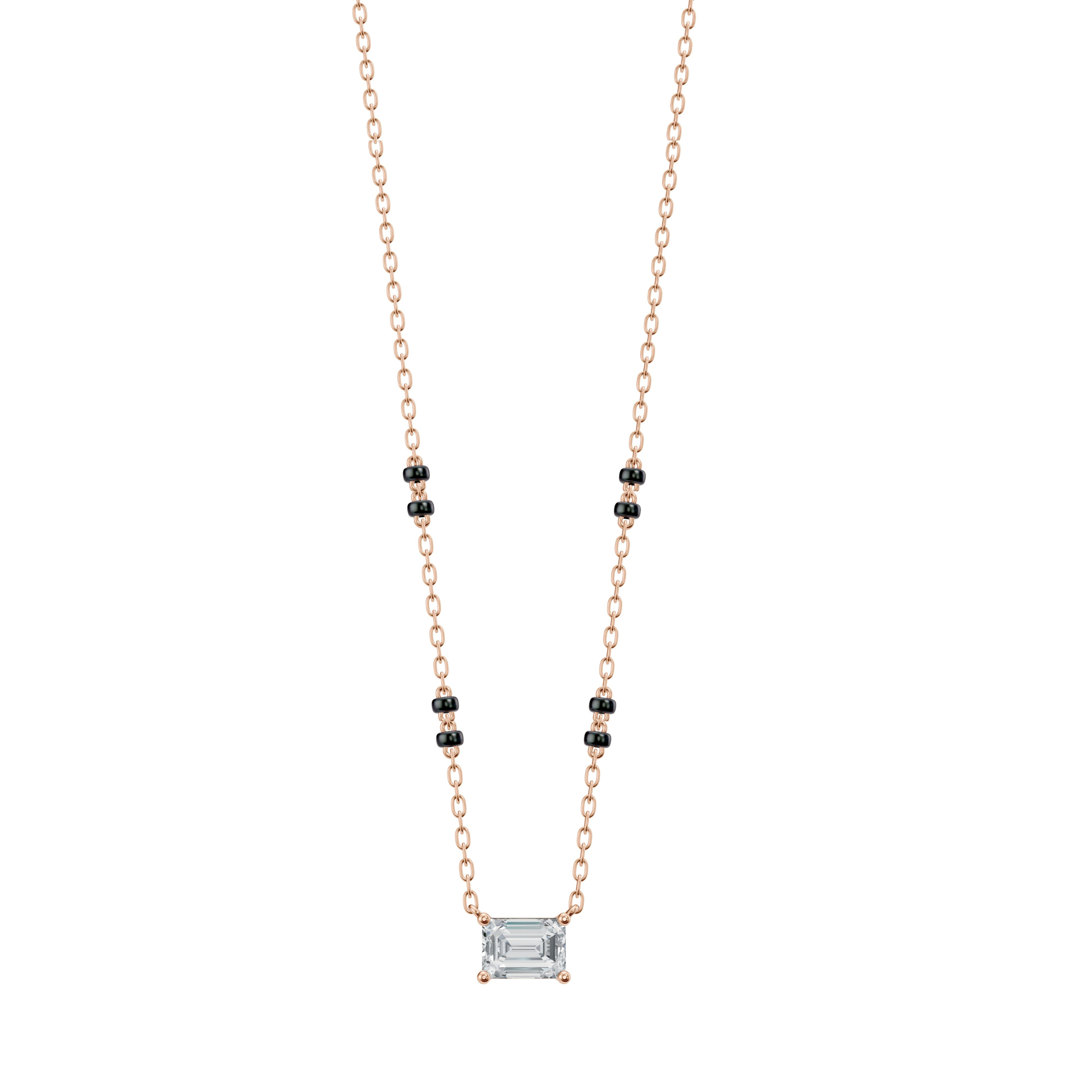 Product image of the Modern Mangal Karishma Mangalsutra in rose gold, showing a horizontally set emerald diamond pendant paired with a warm-toned 4-bead dual black chain.