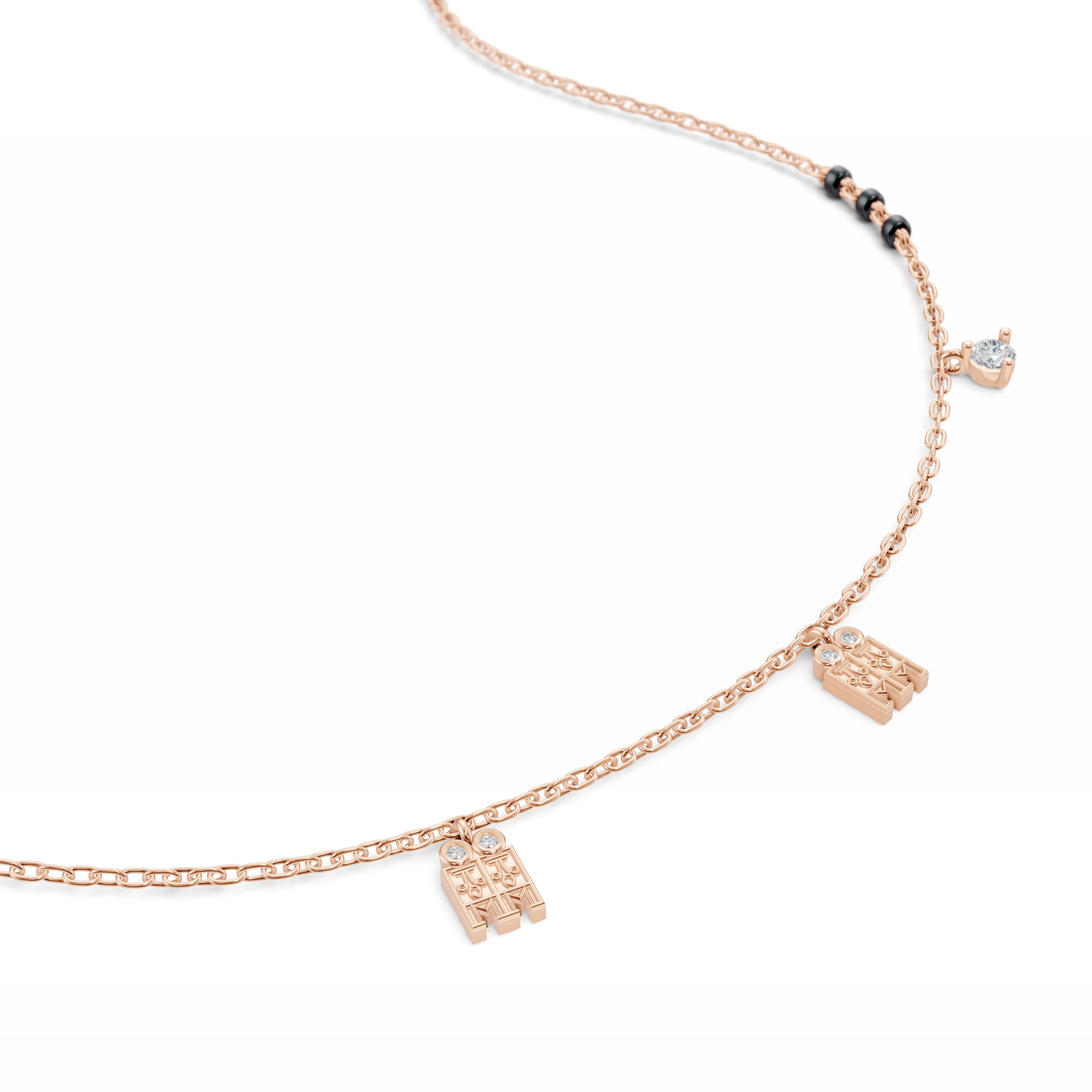 Close up pendant photo of the Modern Mangal Meera Mangalayam in rose gold, highlighting its dual tulsi charms, bezel-set diamonds, and symbolic South Indian inspiration.