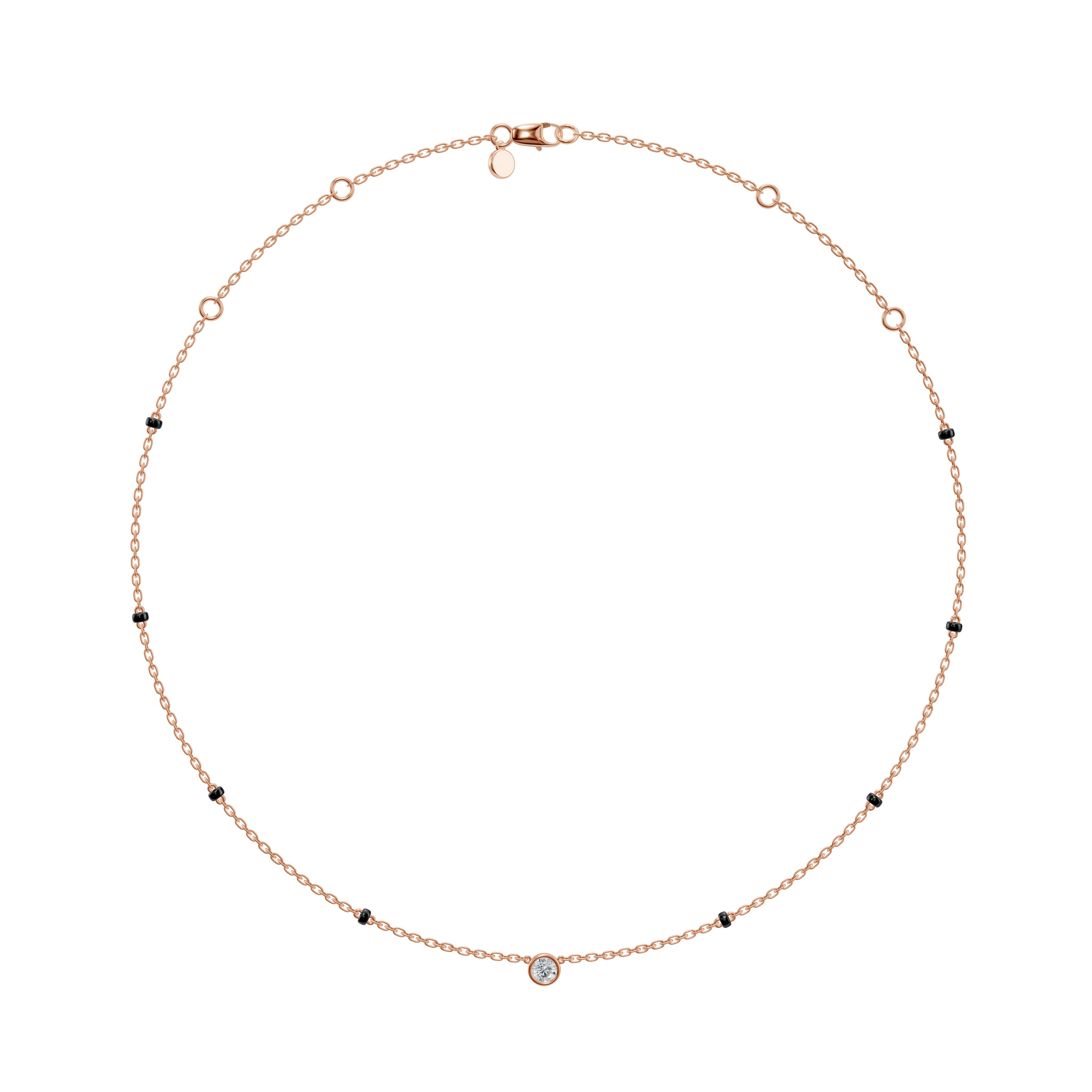 Top-down view of the rose gold Modern Mangal Minnie Mangalsutra showing the warm blush-toned chain with spaced black beads and centered round bezel diamond.
