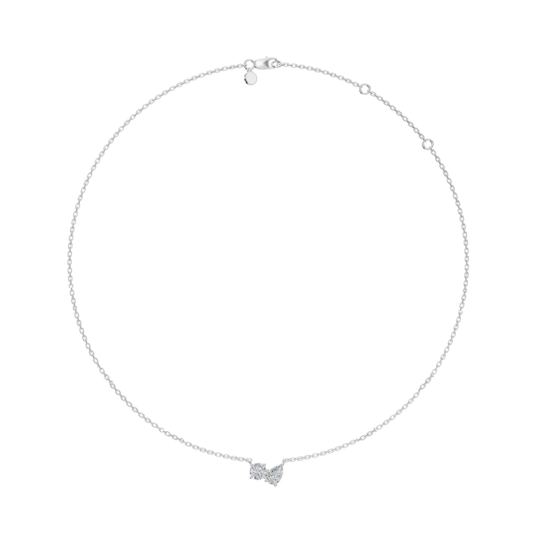 Full-length view of the Modern Mangal Nina Mangalsutra in white gold, showing the spaced black bead chain and Toi et Moi pendant with brilliant round and pear diamonds.