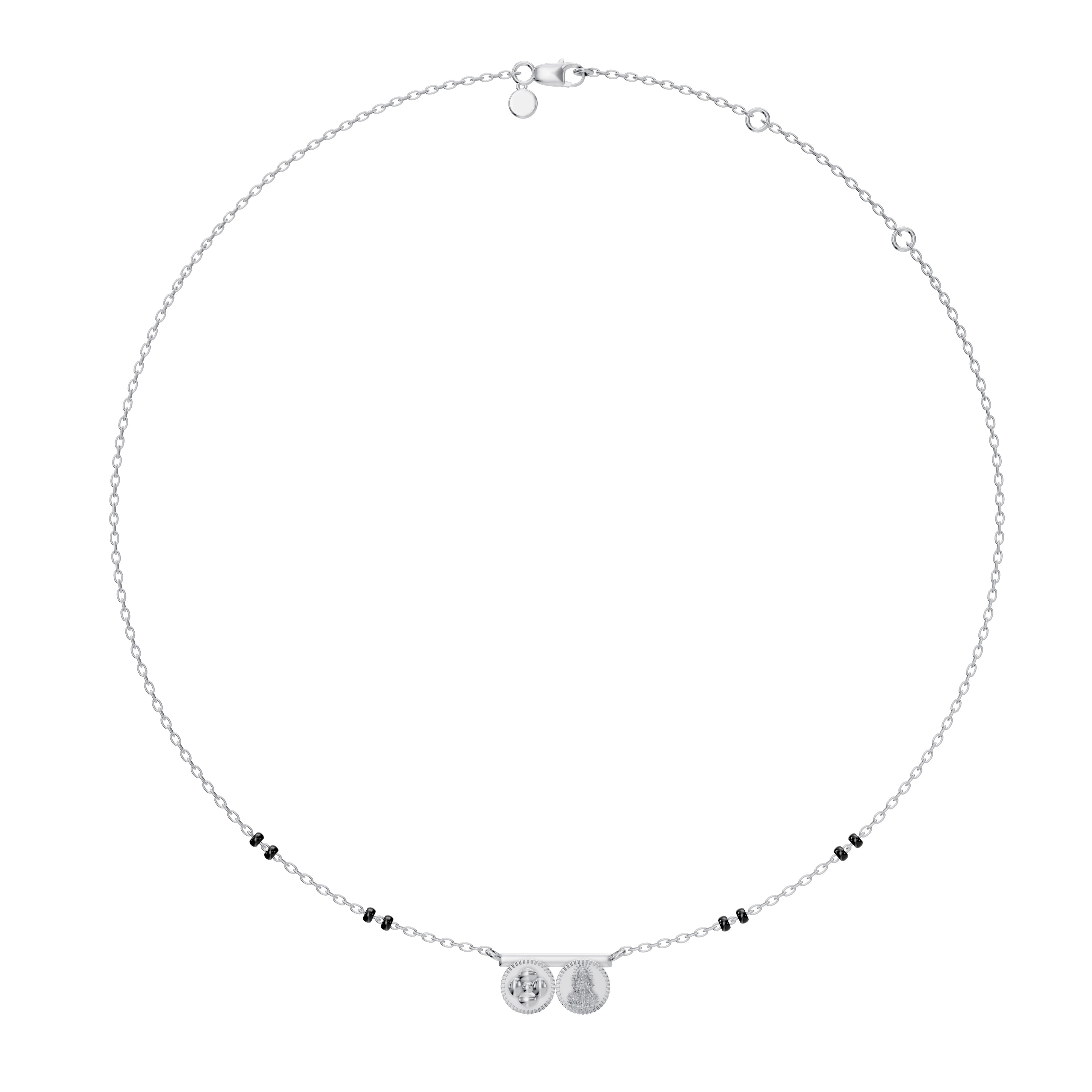 Modern Mangal’s Saanvi Thaali in 18K white gold features a minimalist pendant with floral and Lakshmi kasu coins, crafted to embody Telugu elegance and spiritual harmony.