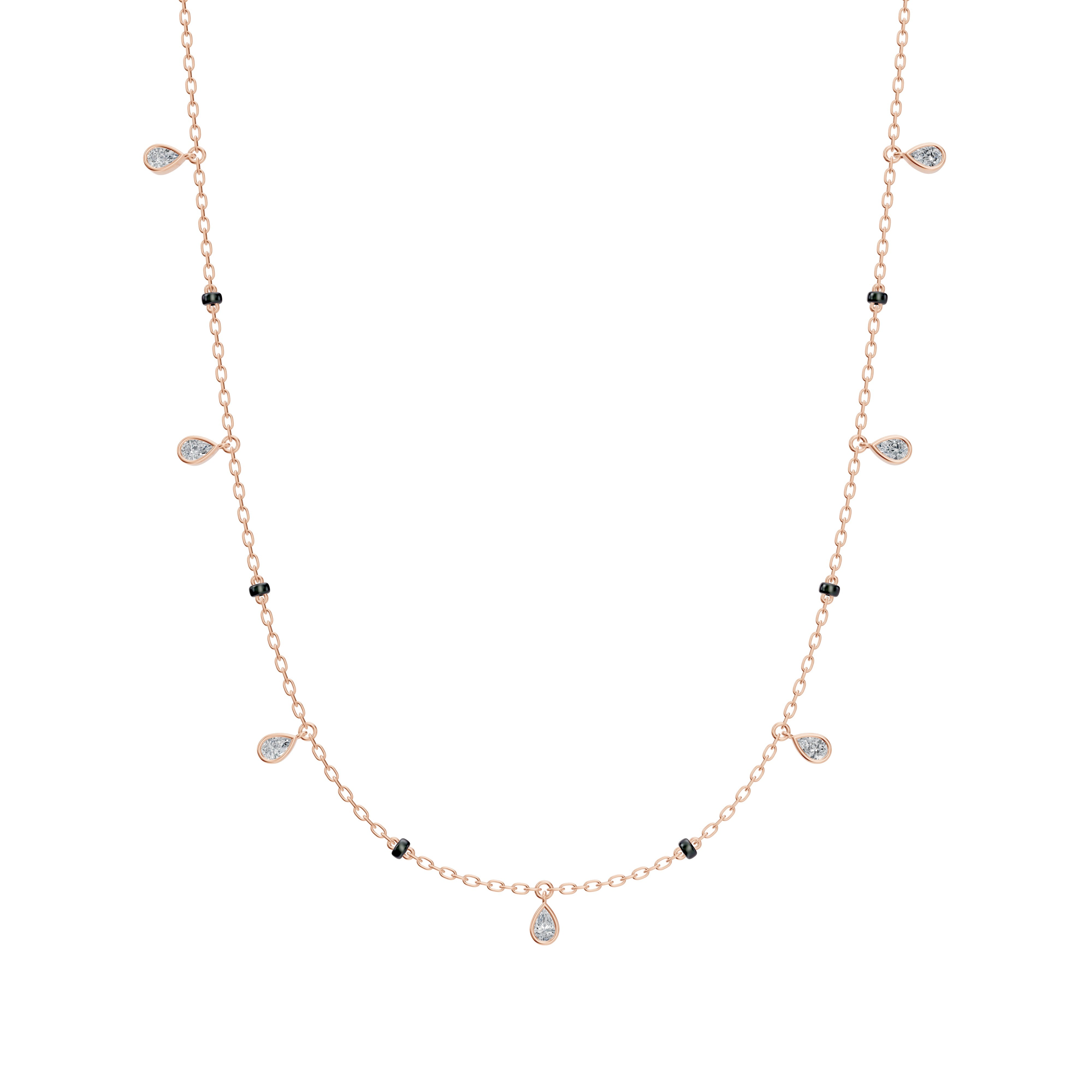 Front image of the  Modern Mangal Shivani Mangalsutra in rose gold, featuring a warm-toned bezel-set pear-shaped diamond pendant gently suspended from black bead chains.
