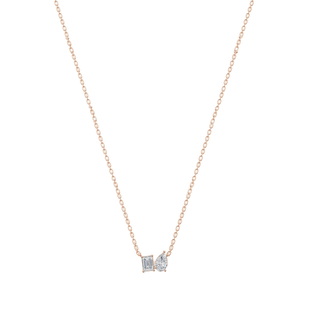 Front product photo of the Modern Mangal Viya Necklace in rose gold, with a distinctive Toi et Moi pendant pairing a soft pear diamond and a sharp emerald-cut diamond.