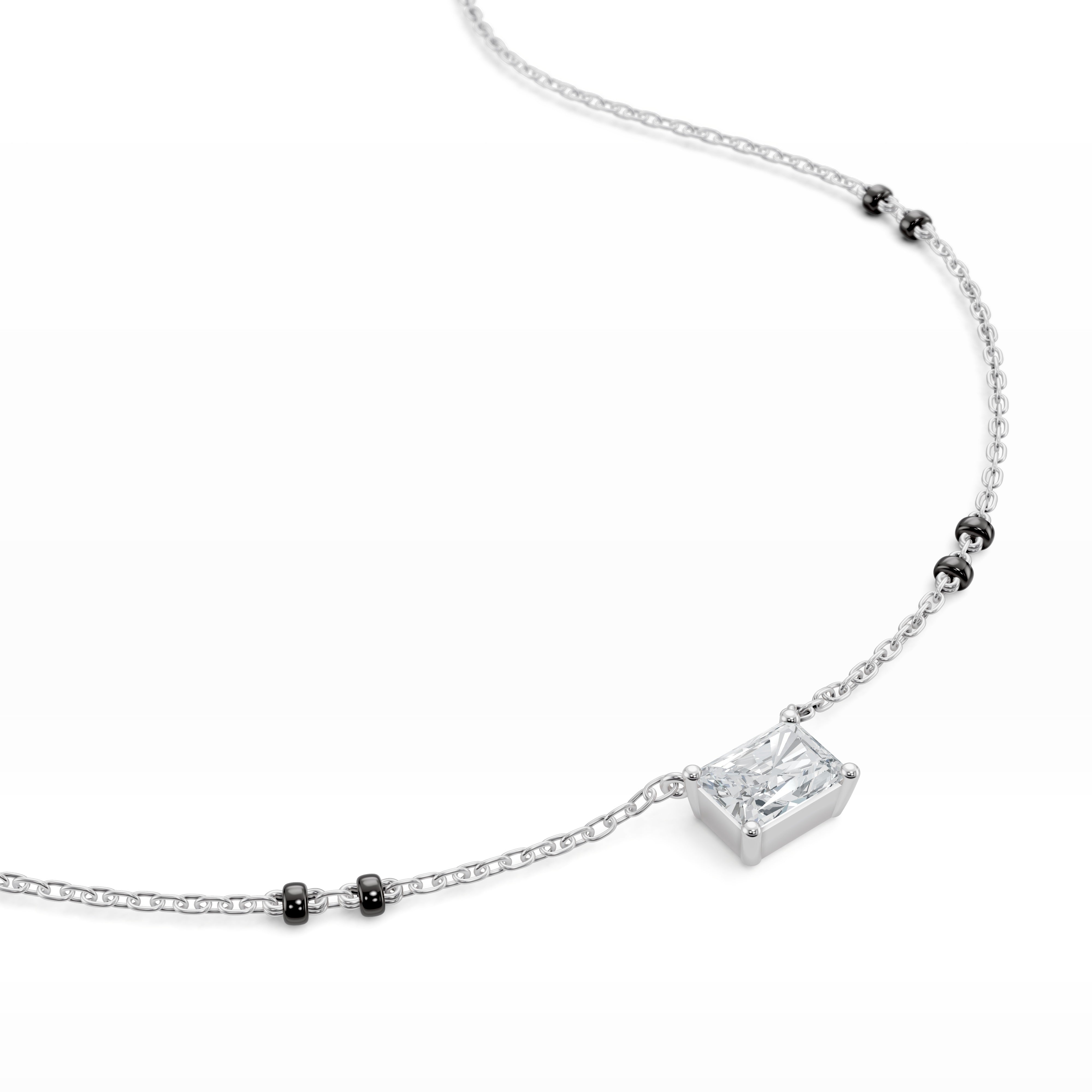 Detailed close-up of the white gold Modern Mangal Radhi Mangalsutra pendant, with an east-west set radiant diamond reflecting brilliant facets