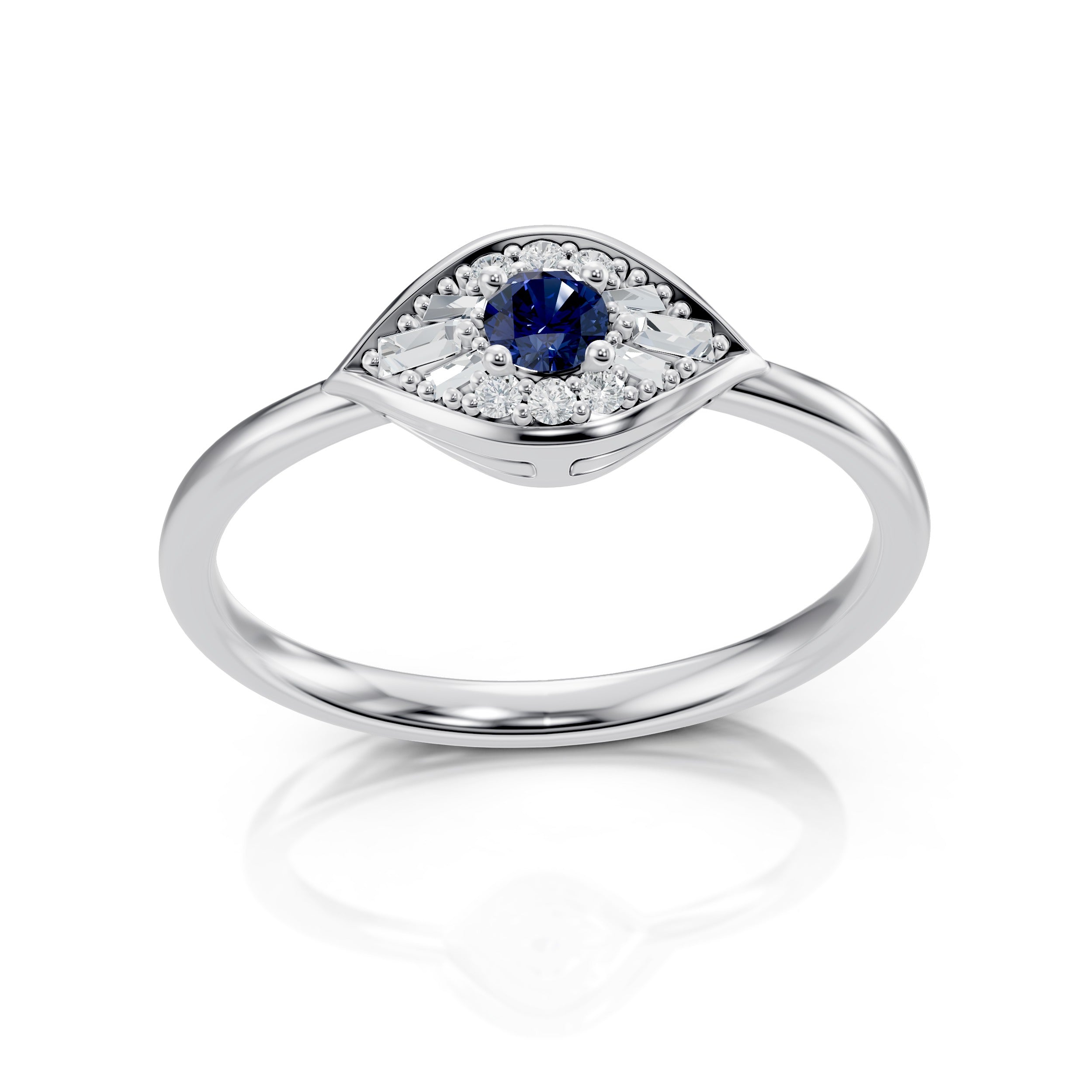 Front-facing view of the Modern Mangal Zuri Ring in 18K white gold, showcasing a rich blue sapphire center encircled by round and baguette-cut diamonds in a sleek evil eye bezel setting.