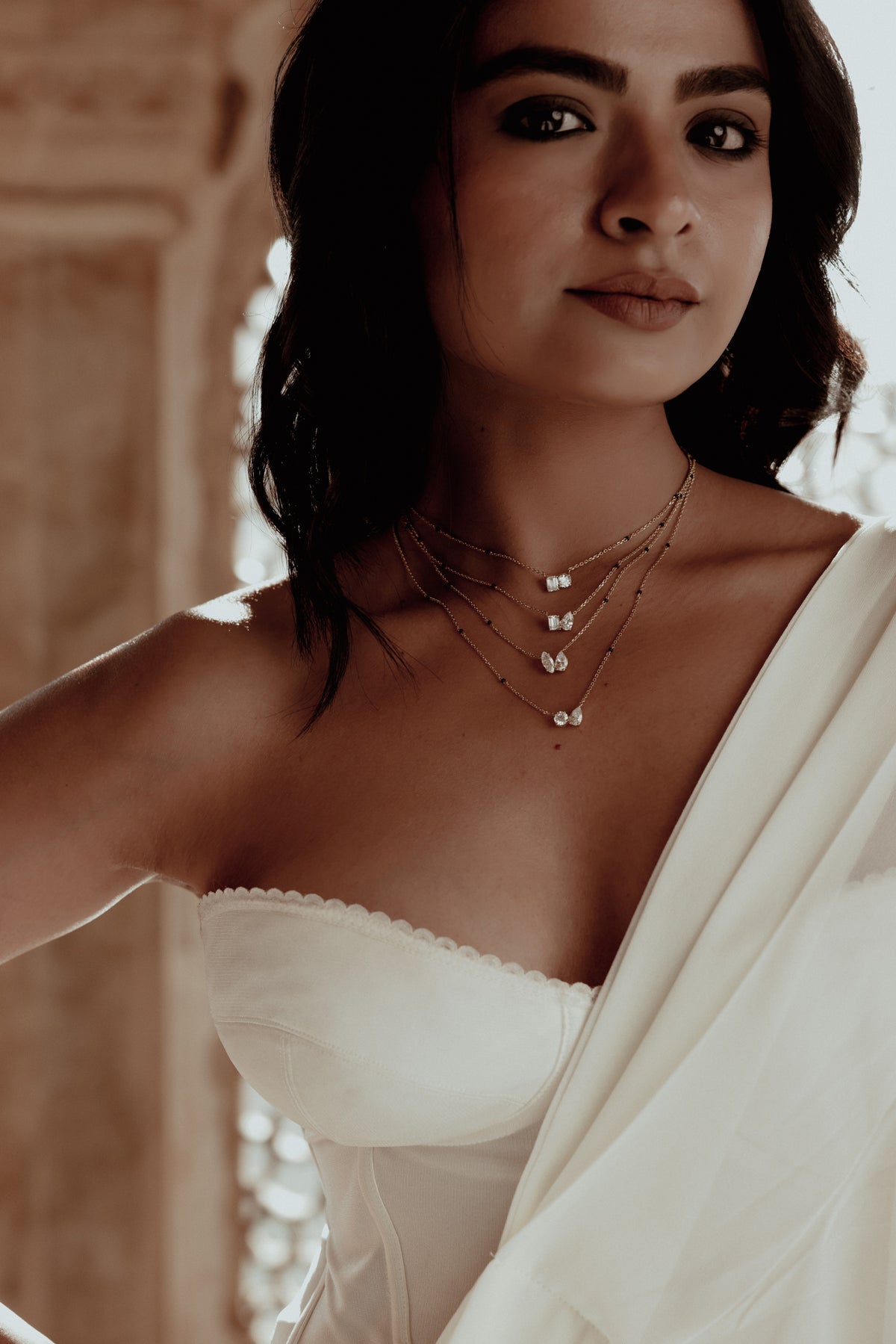 Model wearing the Milaana Collection layered in 18K gold, Jaipur