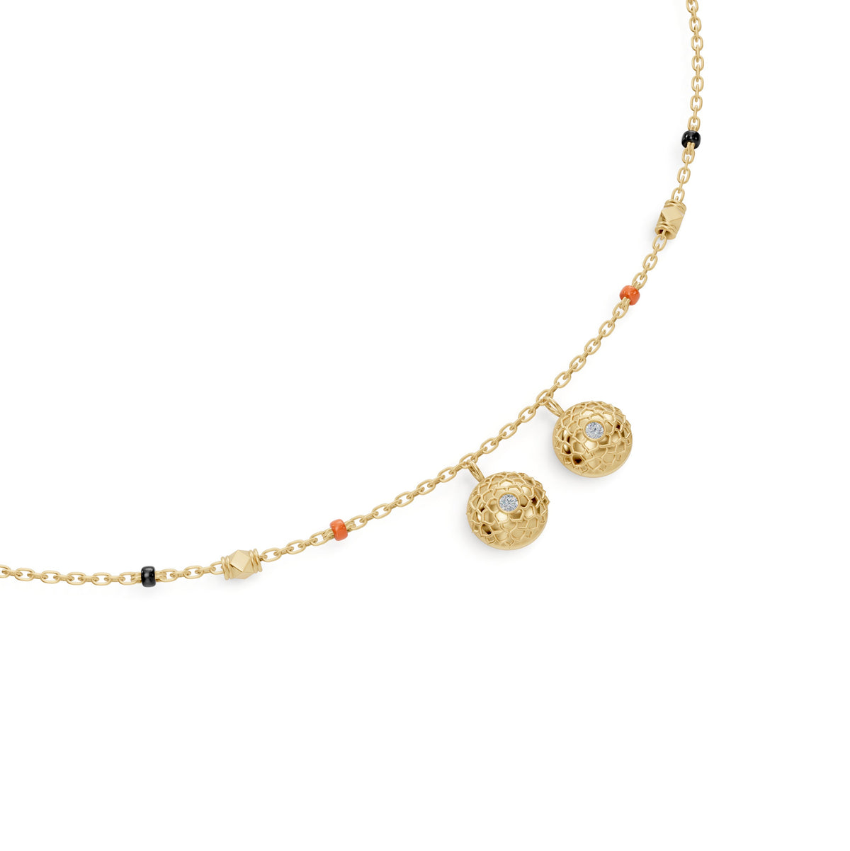 Close-up of the reversible Telugu bottu thaali on the Neha Thaali in 18-karat yellow gold