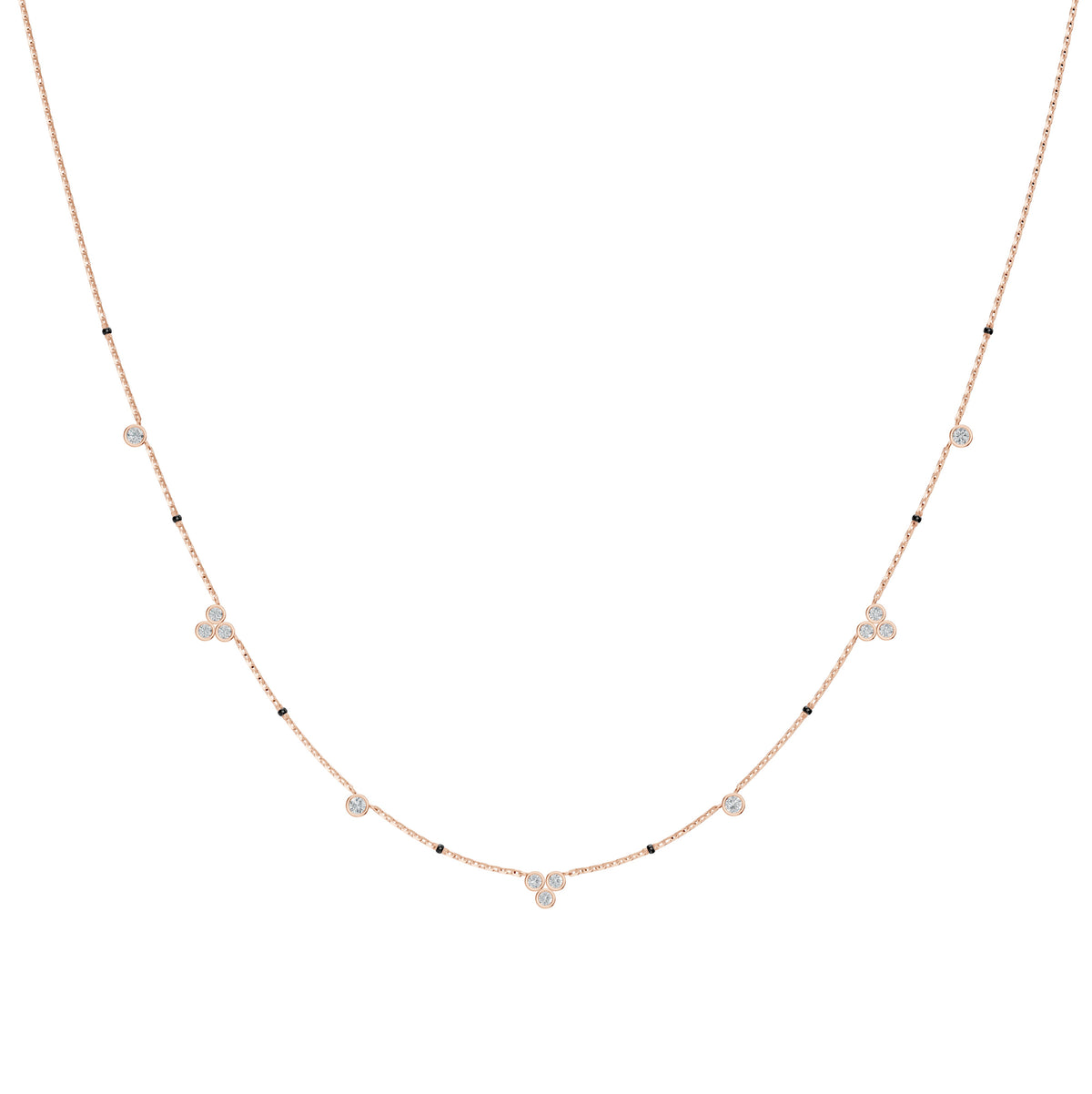 Nidhi Mangalsutra in 18K rose gold with bezel-set diamond stations, front view