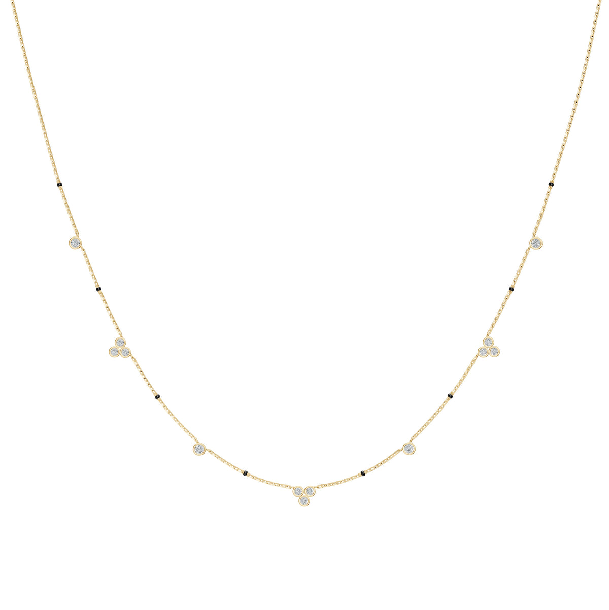 Nidhi Mangalsutra in 18K yellow gold with bezel-set diamond stations, front view