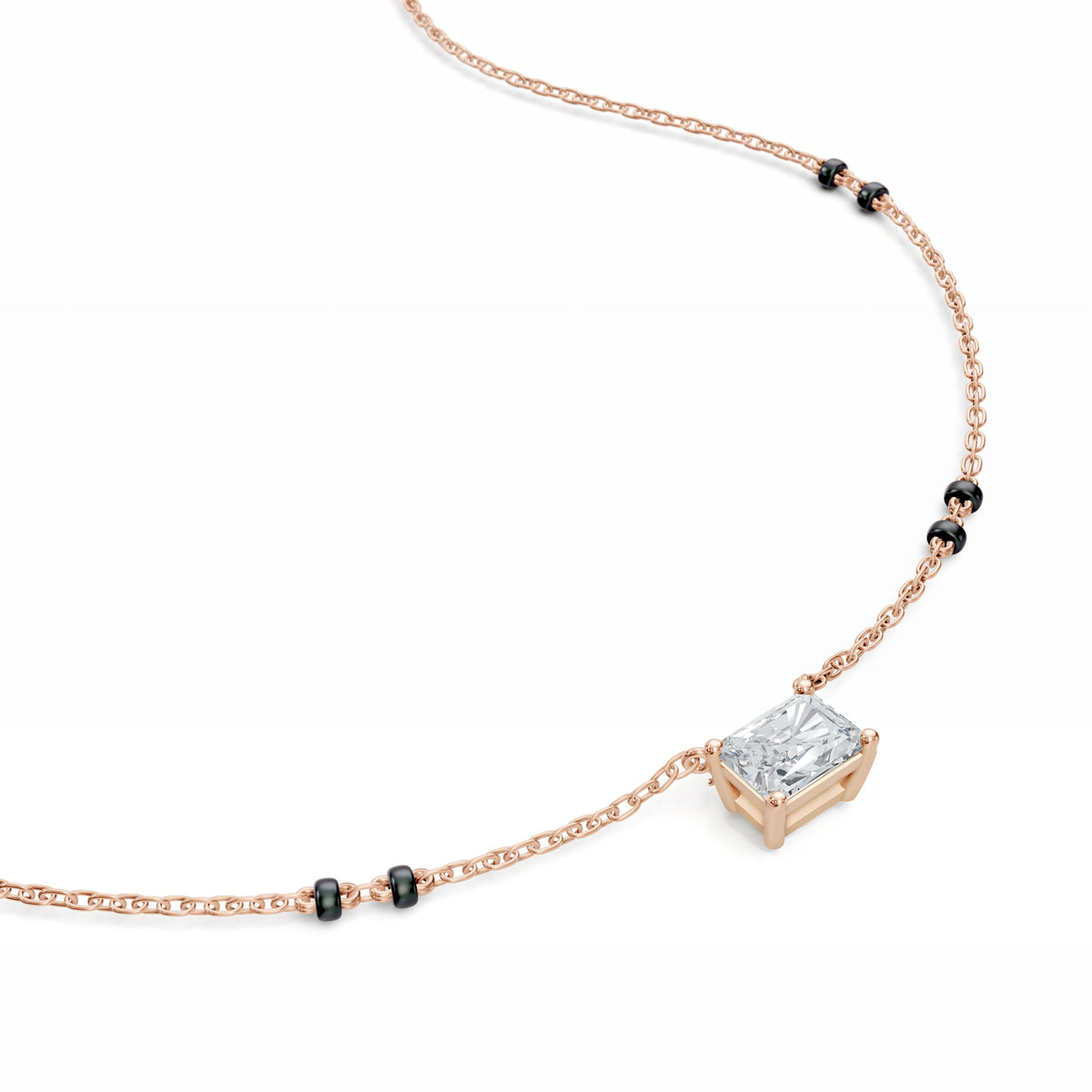Close-up of the radiant lab-grown diamond on the Radhi Mangalsutra in 18K rose gold