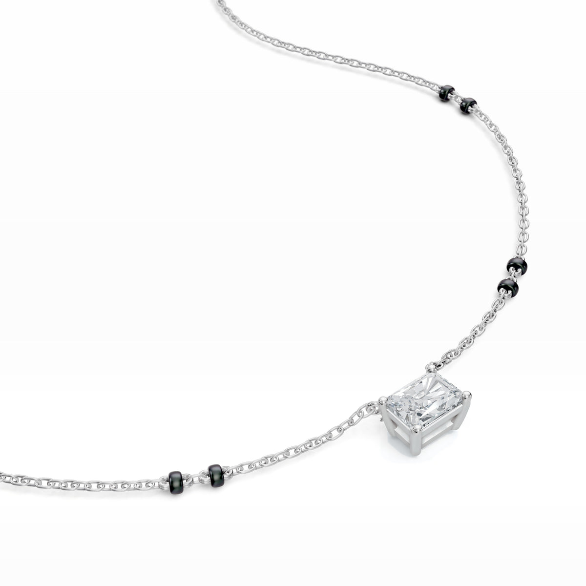 Close-up of the radiant lab-grown diamond on the Radhi Mangalsutra in 18K white gold