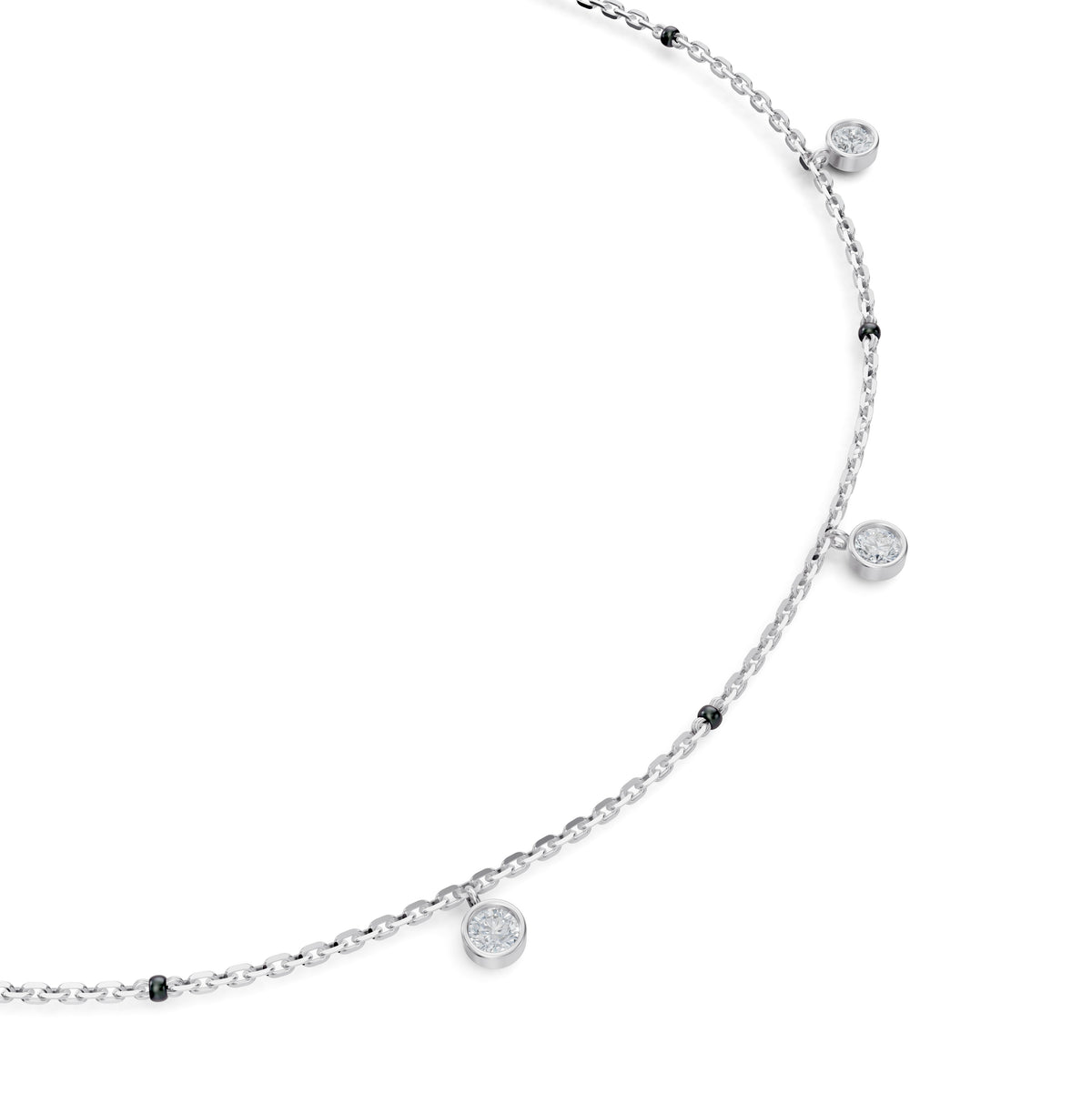 Close-up of the dangling bezel-set round lab-grown diamonds on the Sanjana Mangalsutra in 18K white gold